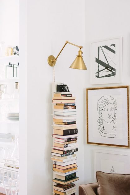 book tower against wall as wall decor