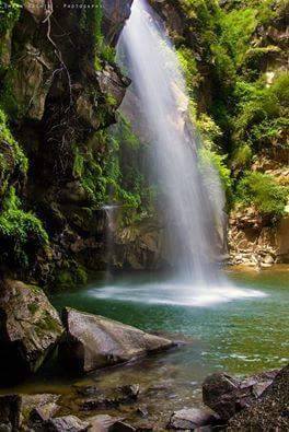 Gushing water falling from the mountains, the Shingari Waterfall in Swat 