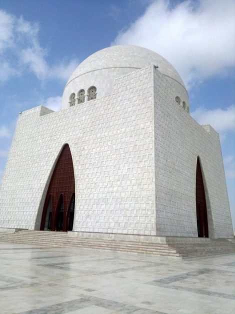 White Jinnah Mausoleum with a background of clear skies and clouds- National Symbols of Pakistan