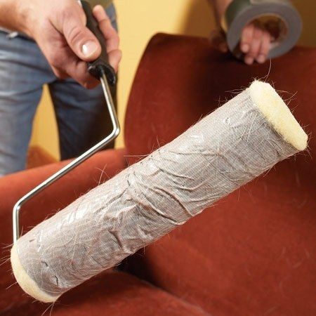 duct tape wrapped around paint roller -popcorn ceiling cleaning hack 