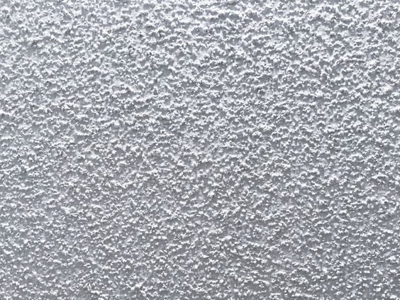 white popcorn ceiling with flaky texture 