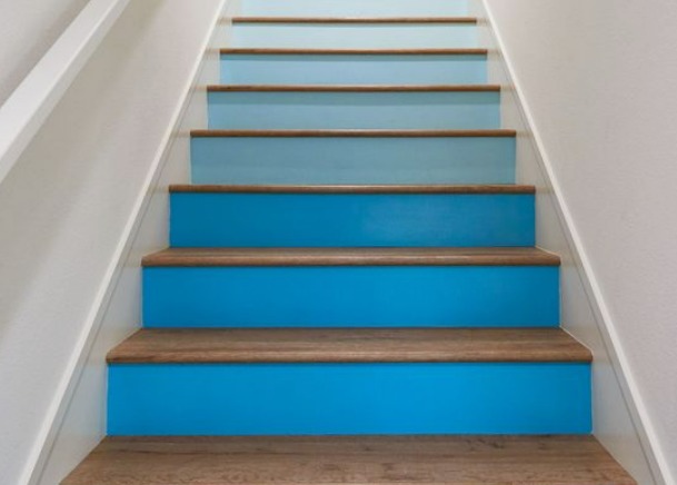 this is an image of ombre staircase which is one of the Staircase Makeover Ideas on a Budget