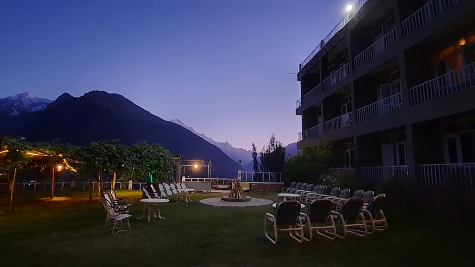 evening time, balcony full of chairs