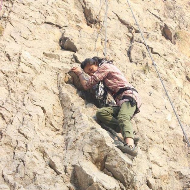 A girl Rock Climbing in Saidpur Village