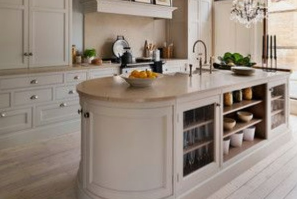 a round kitchen island design with seating for 4
