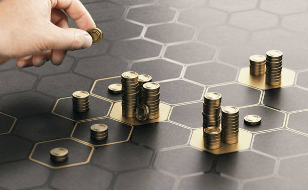 A man placing coins with hand on black background