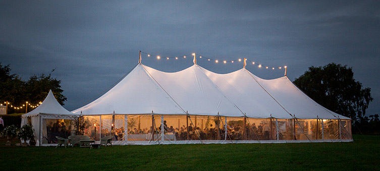 Marriage ceremony taking place in a tent to represent the changes in LDA building regulations for marquees