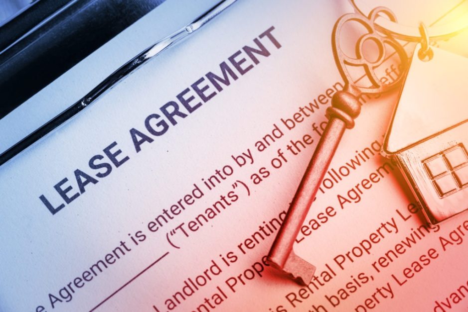 A document on clipboard reading Lease agreement