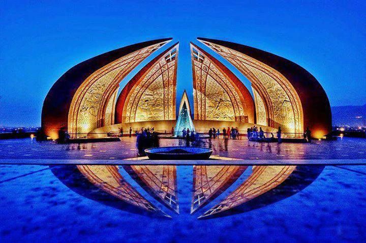 Pakistan monument at night with its reflection on the shiny floor