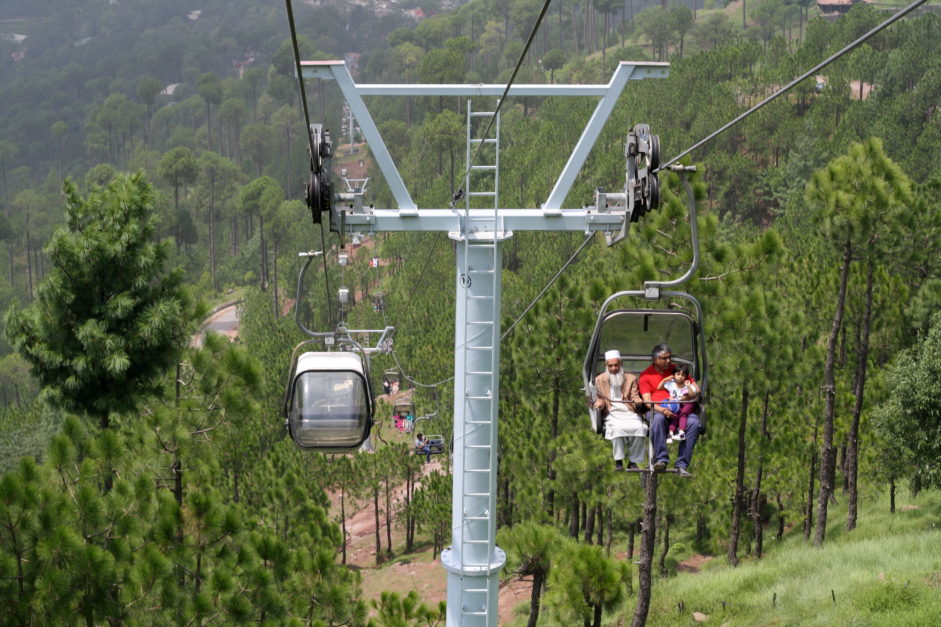 View of the Patriata chairlift running between the pinewood forest