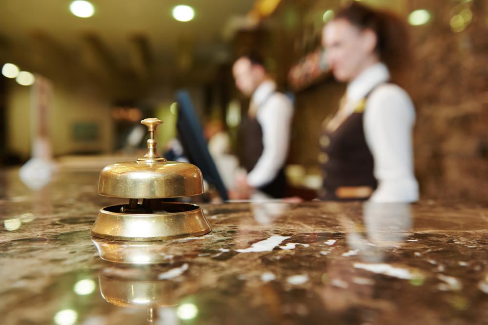 A hotel waiting bell placed on top of the counter | The Resurgence of Pakistan’s Hospitality Sector