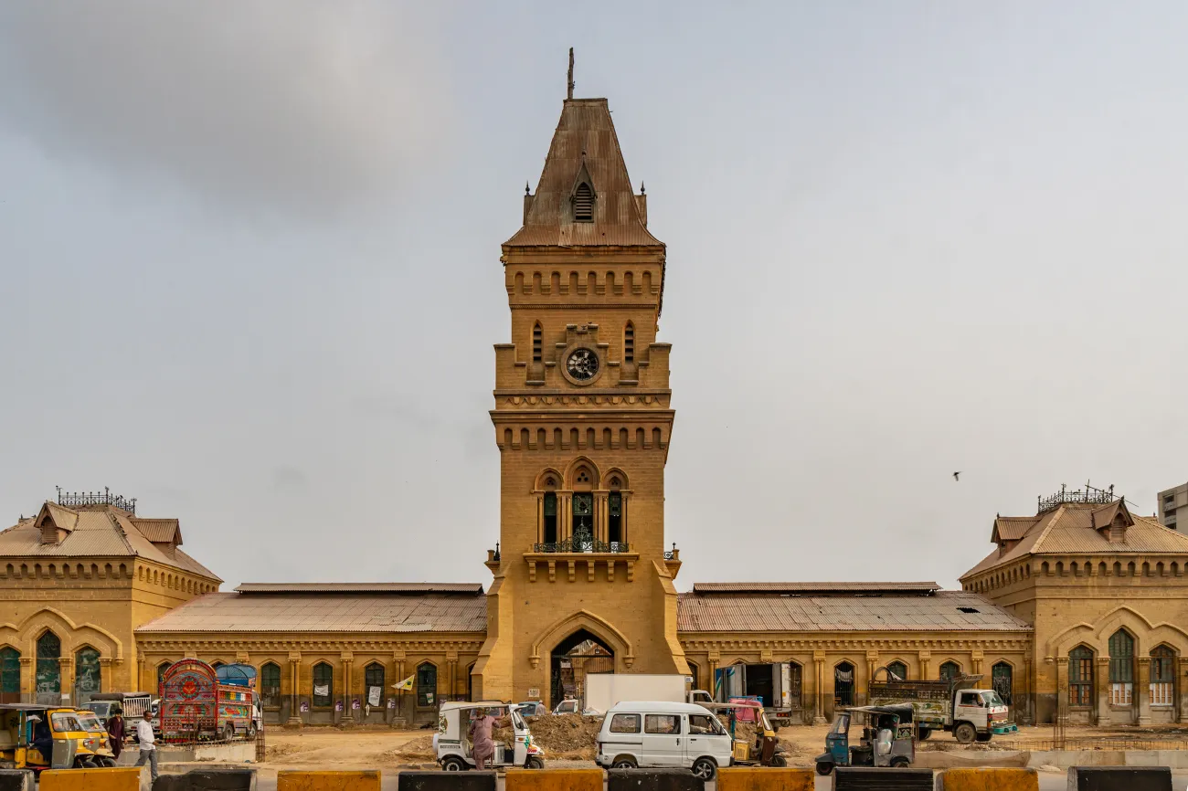 Central tower located in empress market along with vehicles passing by