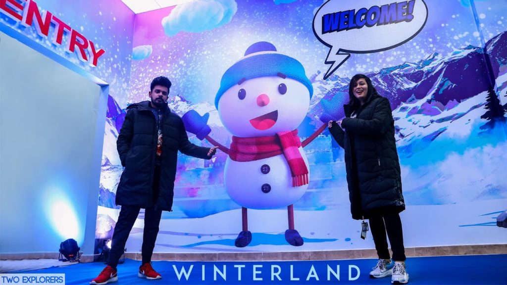 Picture showing two visitors at entrance of Winterland Karachi