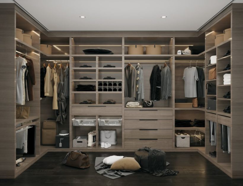 a walk in closet with different type of clothes