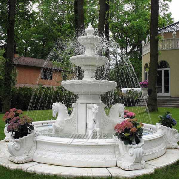 white Fountain in a garden