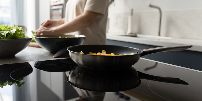 frying pan on induction stove 