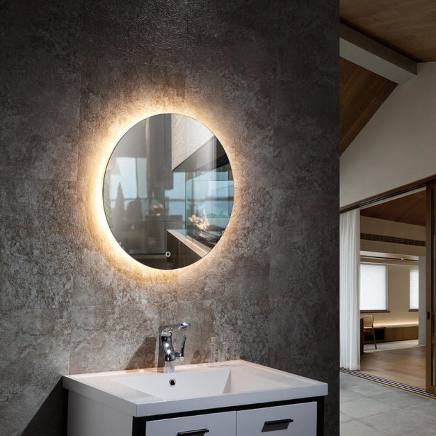 Backlit Mirror hanged on a bathroom wall