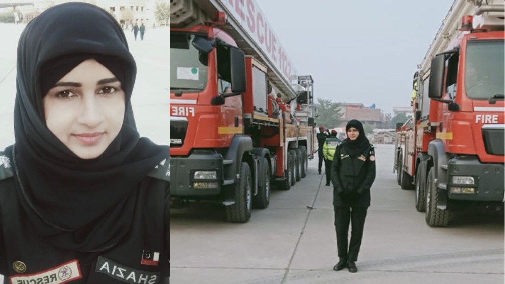 Shazia perveen standing infront of firetrucks