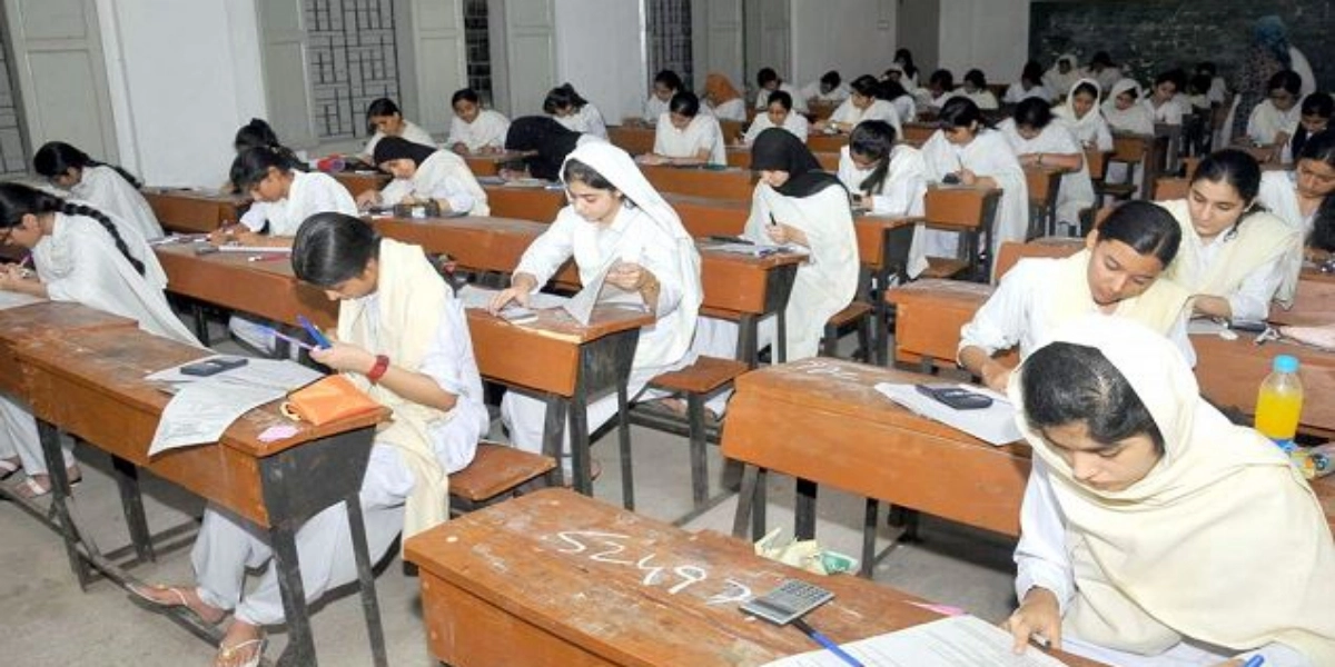 students taking exams in the exam hall