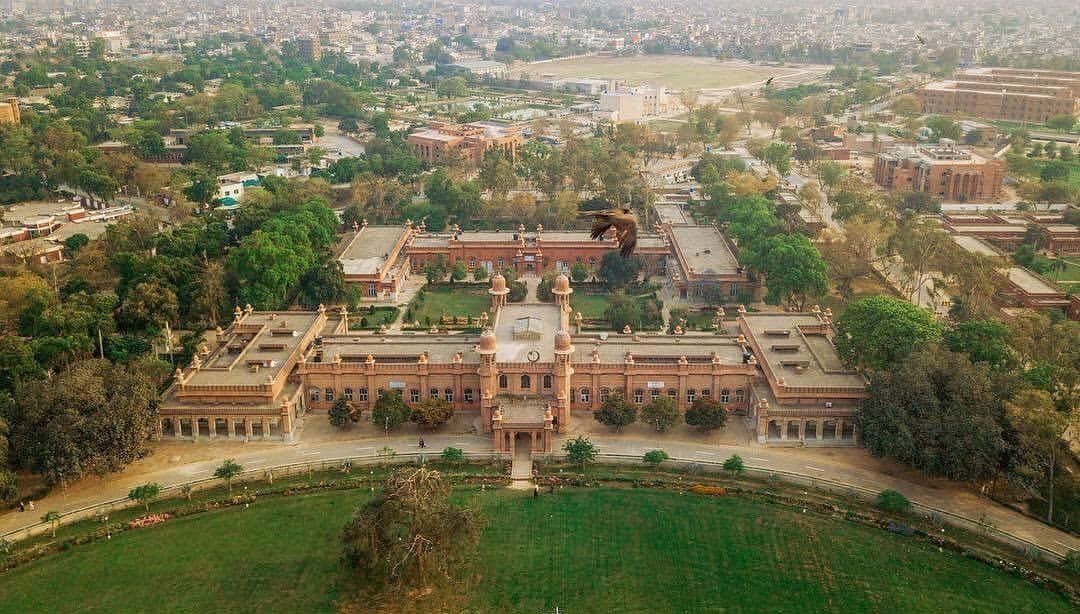 Ariel view of university of agriculture Faisalabad surrounded by other buildings in the city