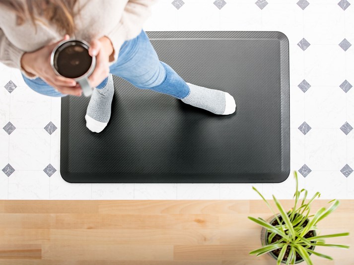 girl standing on Anti-Fatigue Mat