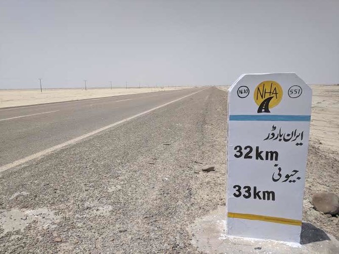 Milestone of National Highway displaying the distance to Iran Border and jeoni