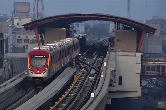 orange train line on rail