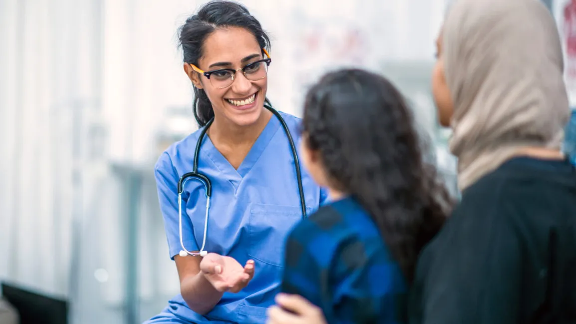 A doctor talking with patient