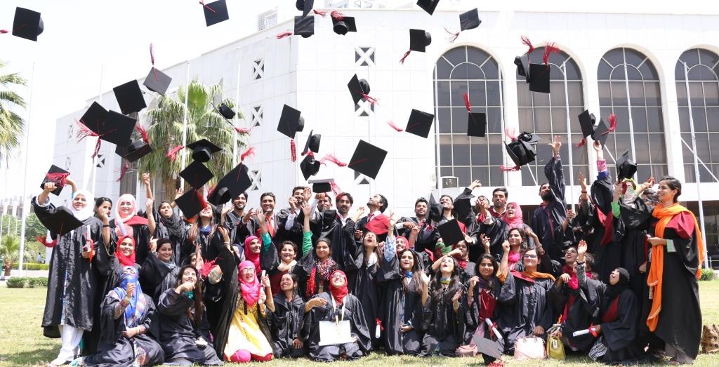students throwing their hats on graduation ceremony at ARID university
