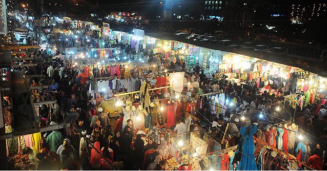  People are throng at Haidery market which is illuminated by stall holders 