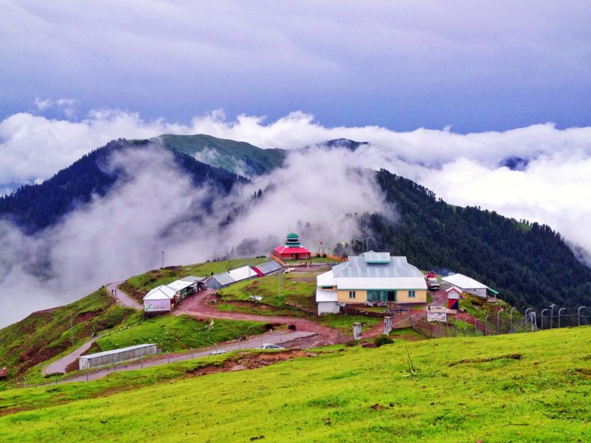 Pir chinasi green top with huts covered in clouds