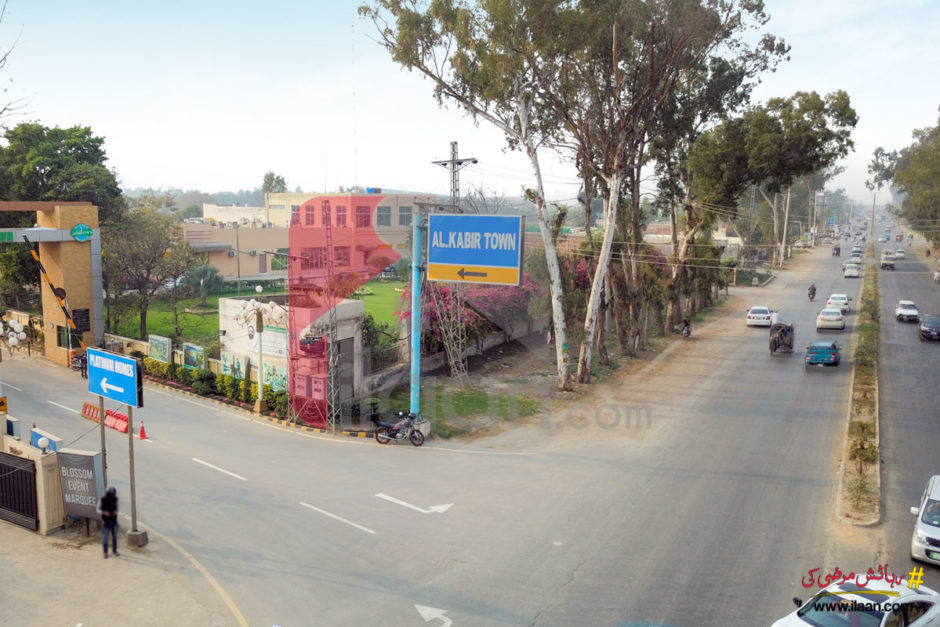 highway with a road leading to Al Kabir Town Lahore