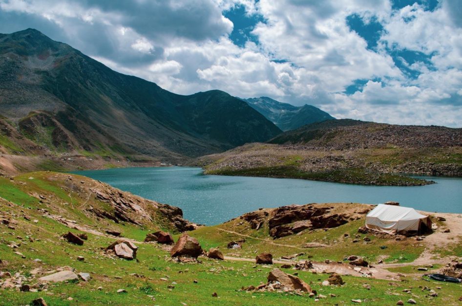 lulusar lake with majestic mountains on the rear view