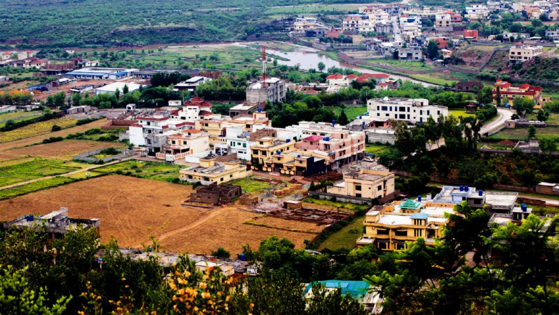 Ariel view of houses and plots in Chak Shahzad