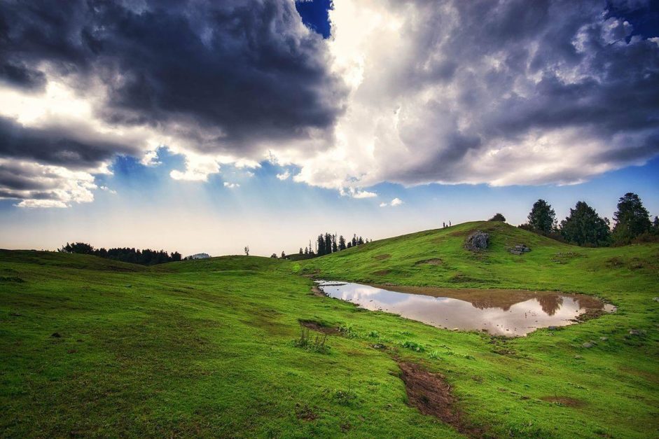 Mushkpuri Peak covered with dense dark clouds