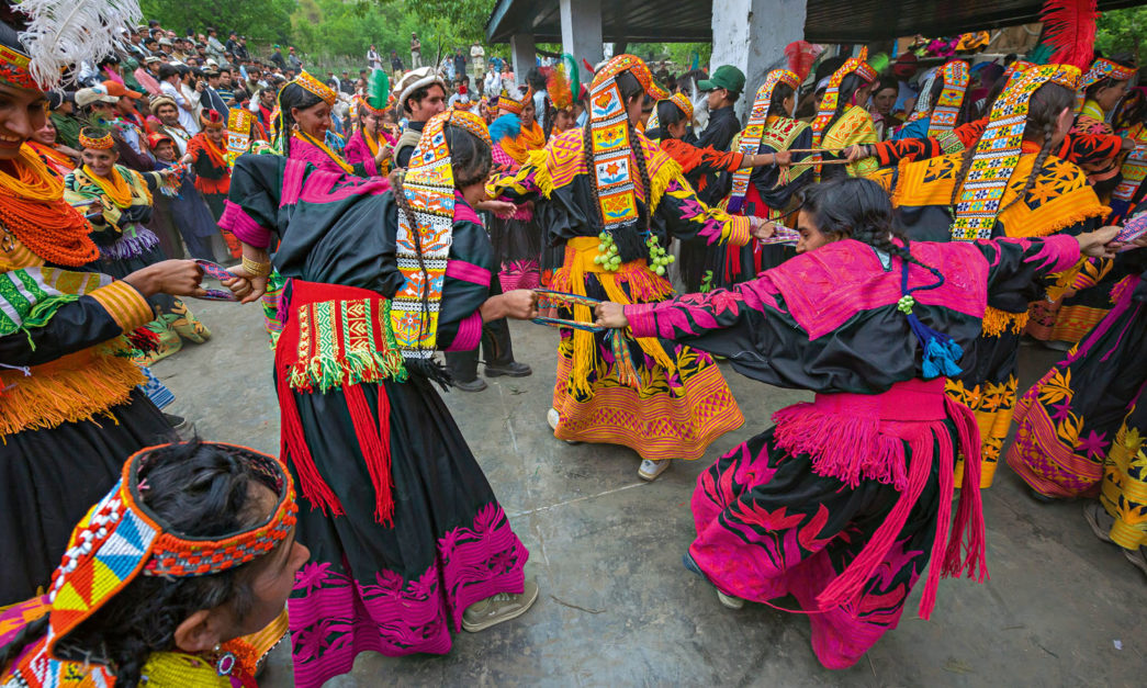 locals dancing at the kalash festival