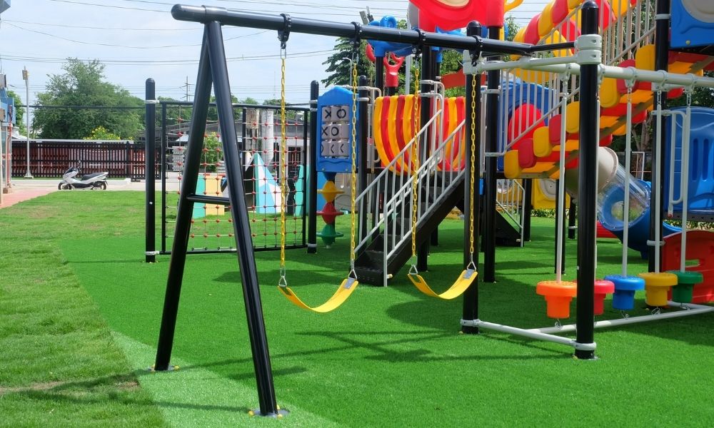 slides and swings at a kids poark