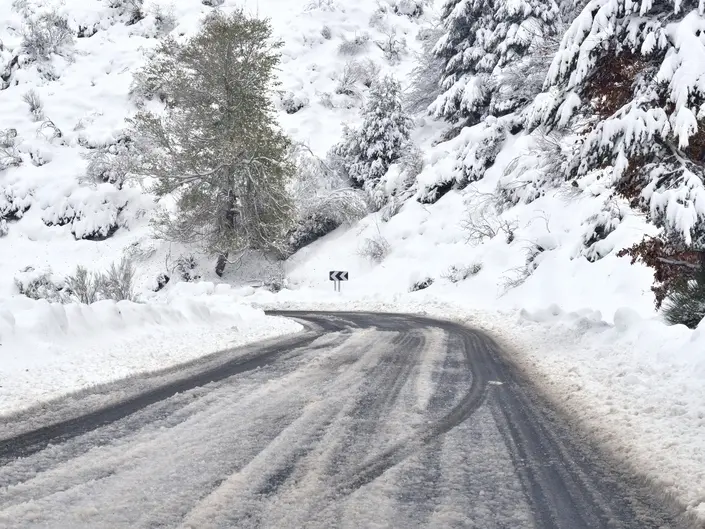 snow covered roads and mountains in parachinar