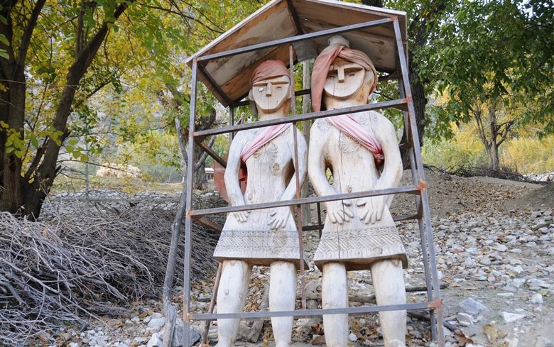 statues of religious figues in kalash valley