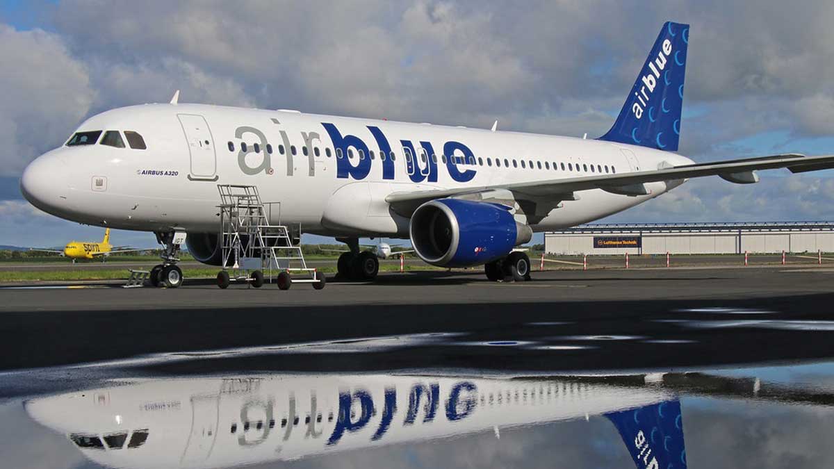 Airblue plane parked at the runway