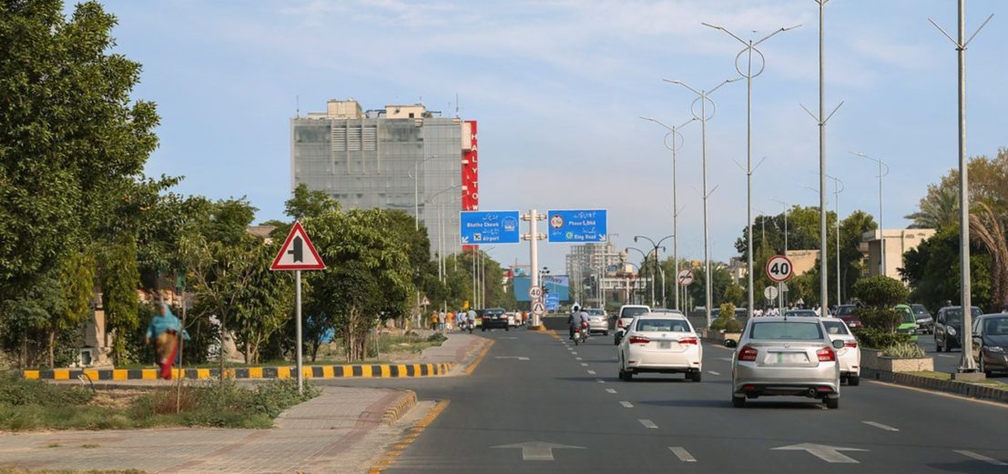  Car travelling on main avenue in DHA Phase 5 Lahore