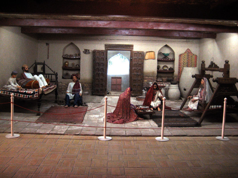 A models of man and women inside Museum