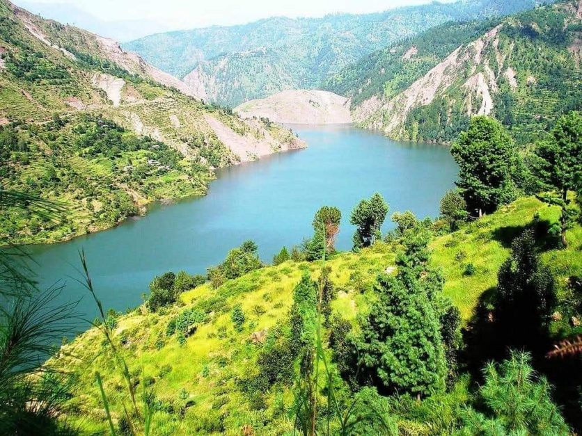 Zalzal Lake covered with green mountains