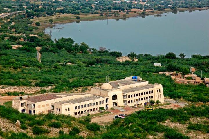 Building and greenery nearby Namal Lake