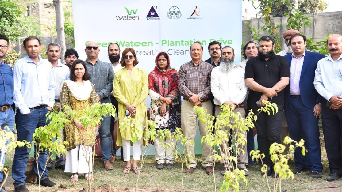 Wateen Telecom standing for a photo after Planting 1000 Trees at Quaid e Azam Industrial Estate