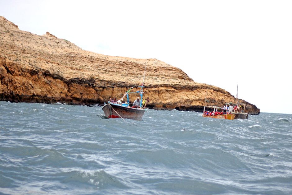 Boating at Charna Island with boats and passangers