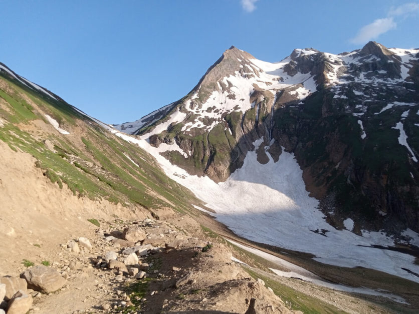 Dangerous road to noori top and noori top covered in snow patches