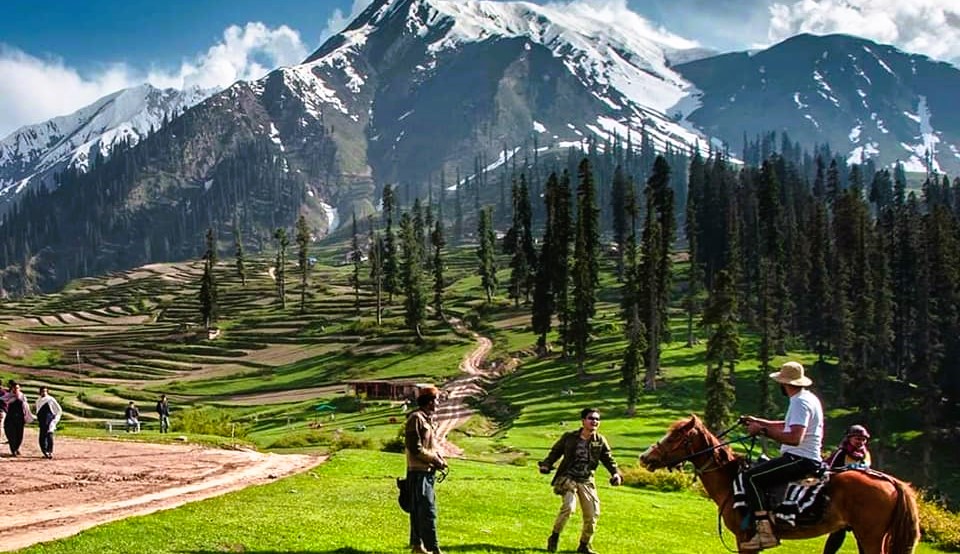 Visitors enjoying and riding horse in Lalazar Meadows