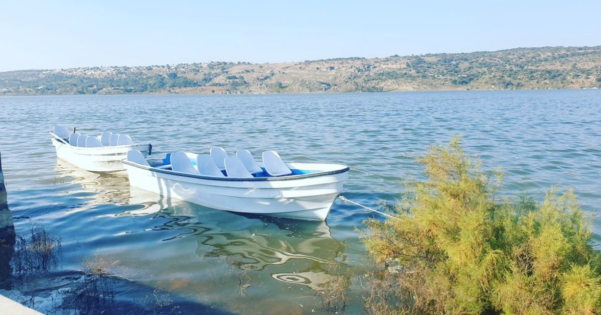 boats docked at khabeki lake