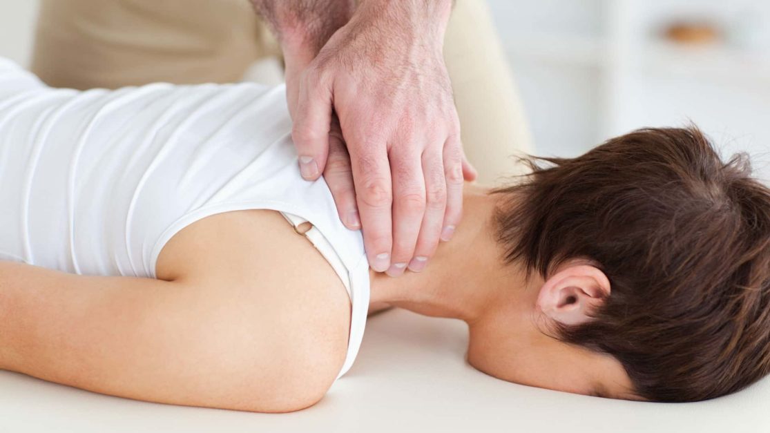 Chiropractor treating Neck Pain